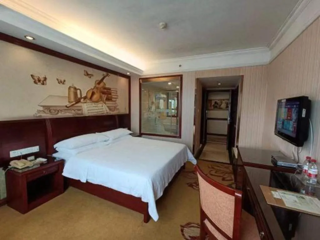 Bed in Vienna Hotel Nanning Train Station