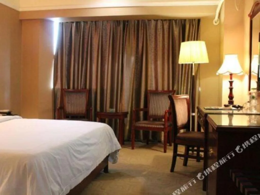 Bed in Vienna Hotel Nanning Train Station