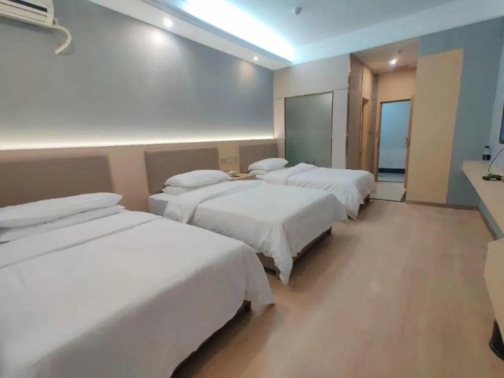 Bed in Vienna Hotel Nanning Train Station