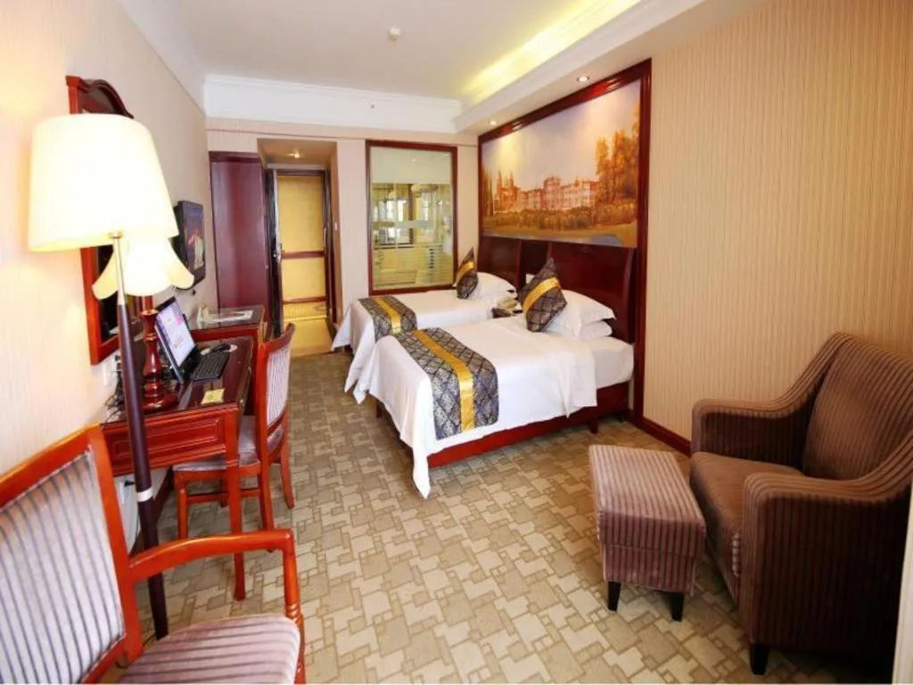 Bed in Vienna Hotel Nanning Train Station