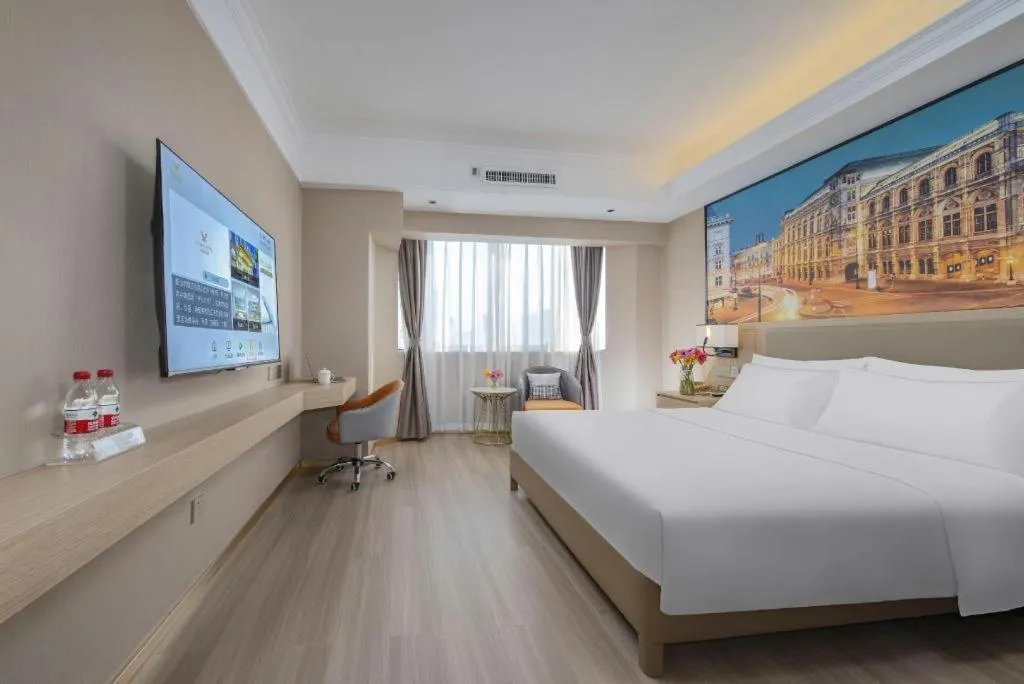 Bed in Vienna Hotel Nanning Train Station