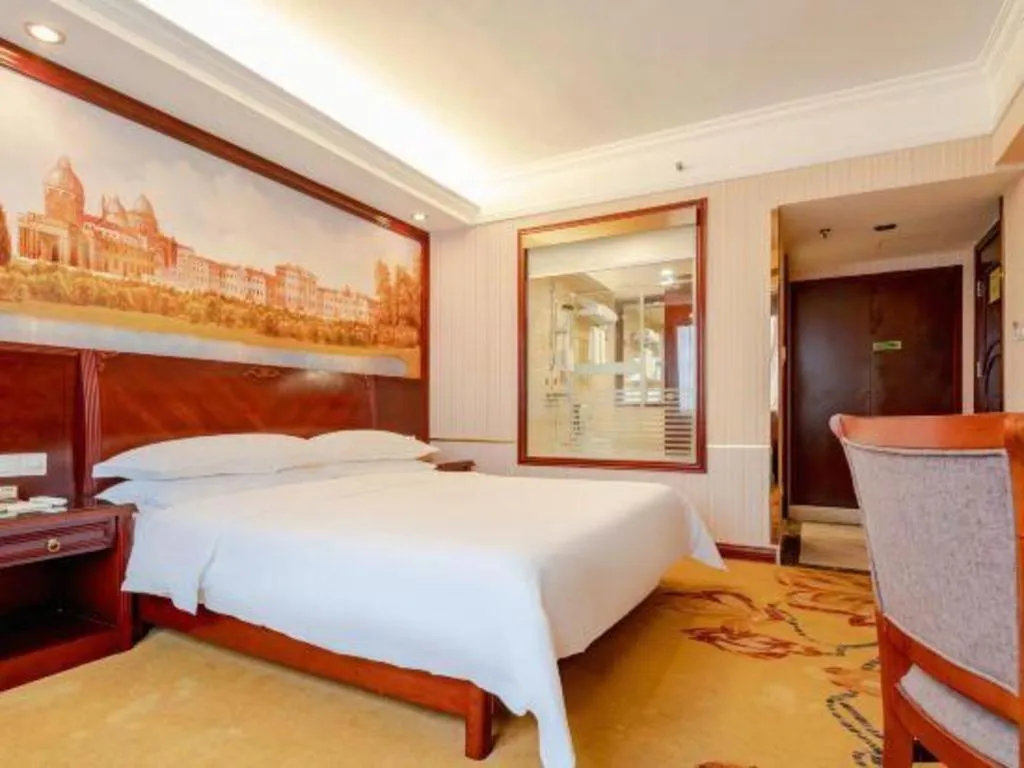 Bed in Vienna Hotel Nanning Train Station