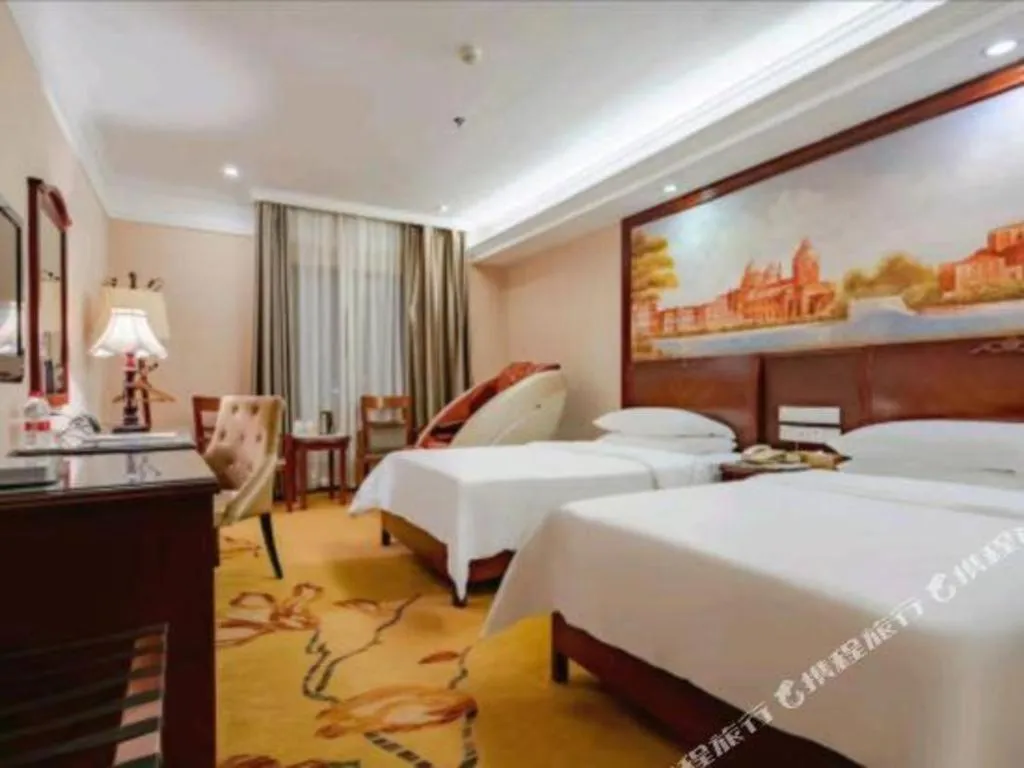 Bed in Vienna Hotel Nanning Train Station