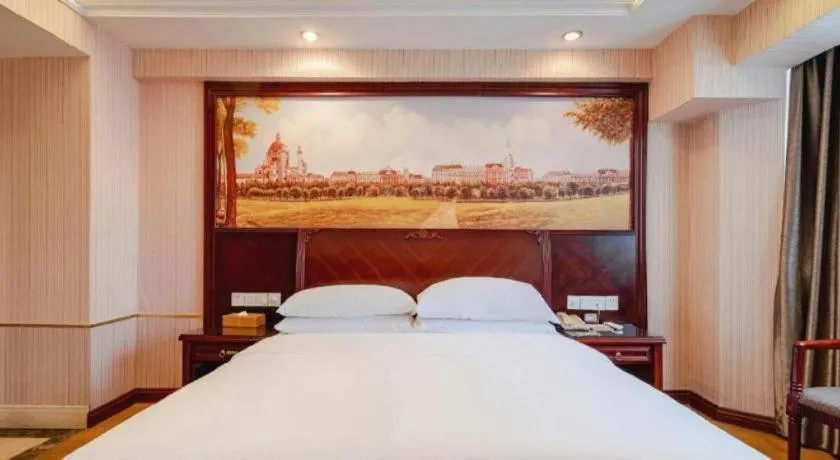 Bed in Vienna Hotel Nanning Train Station