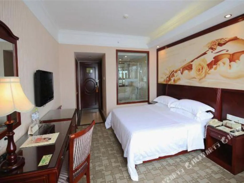 Bed in Vienna Hotel Nanning Train Station