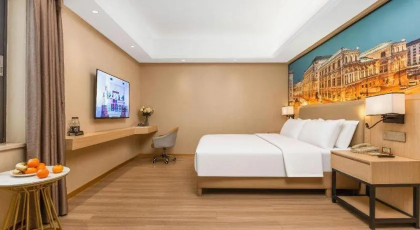 Bed in Vienna Hotel Nanning Train Station