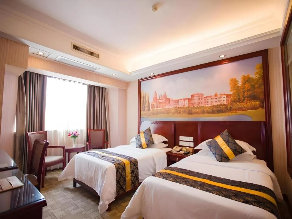 Bed in Vienna Hotel Nanning Train Station