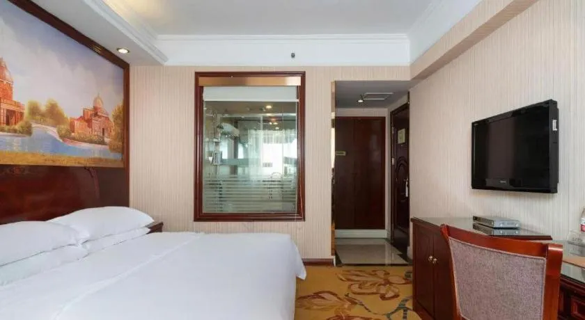 Bed in Vienna Hotel Nanning Train Station