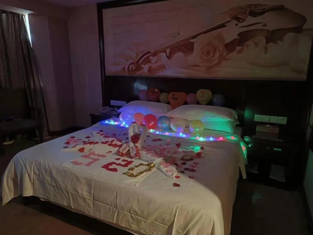 Bed in Vienna Hotel Nanning Train Station