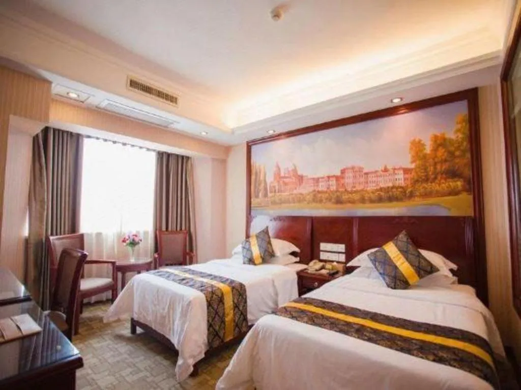 Bed in Vienna Hotel Nanning Train Station