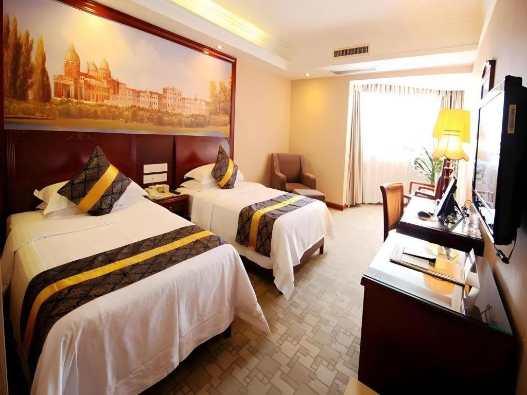 Bed in Vienna Hotel Nanning Train Station