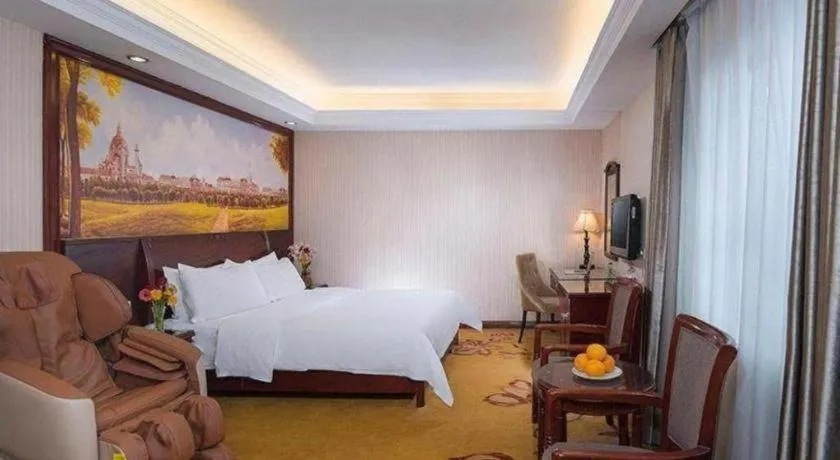 Bed in Vienna Hotel Nanning Train Station