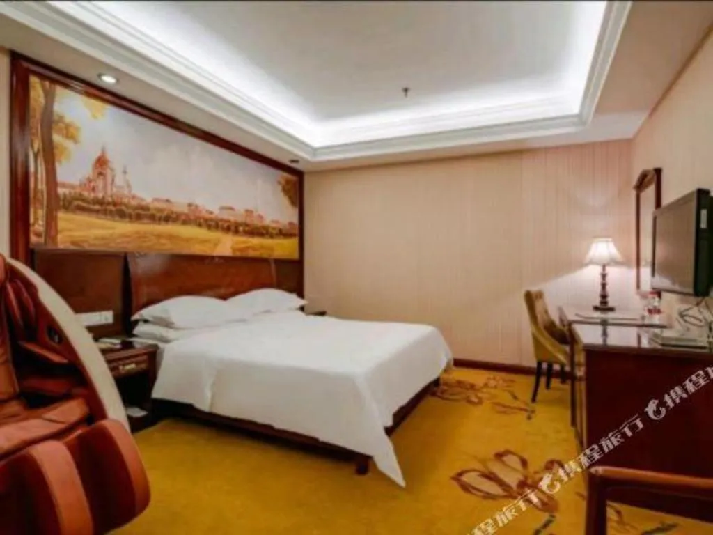 Bed in Vienna Hotel Nanning Train Station