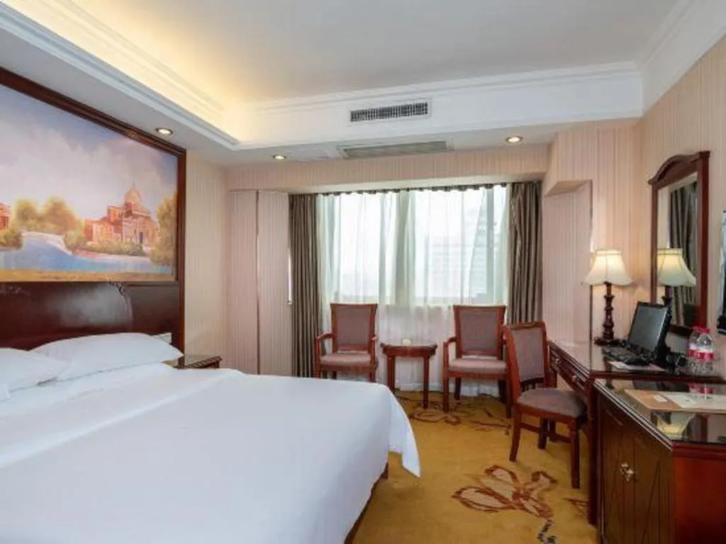 Bed in Vienna Hotel Nanning Train Station