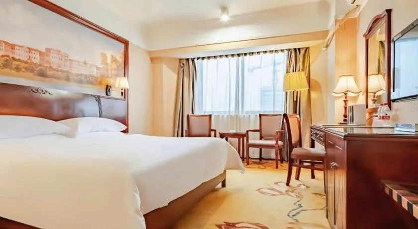 Bed in Vienna Hotel Nanning Train Station