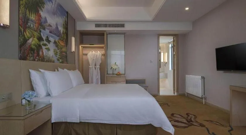 Bed in Vienna Hotel Nanning Train Station