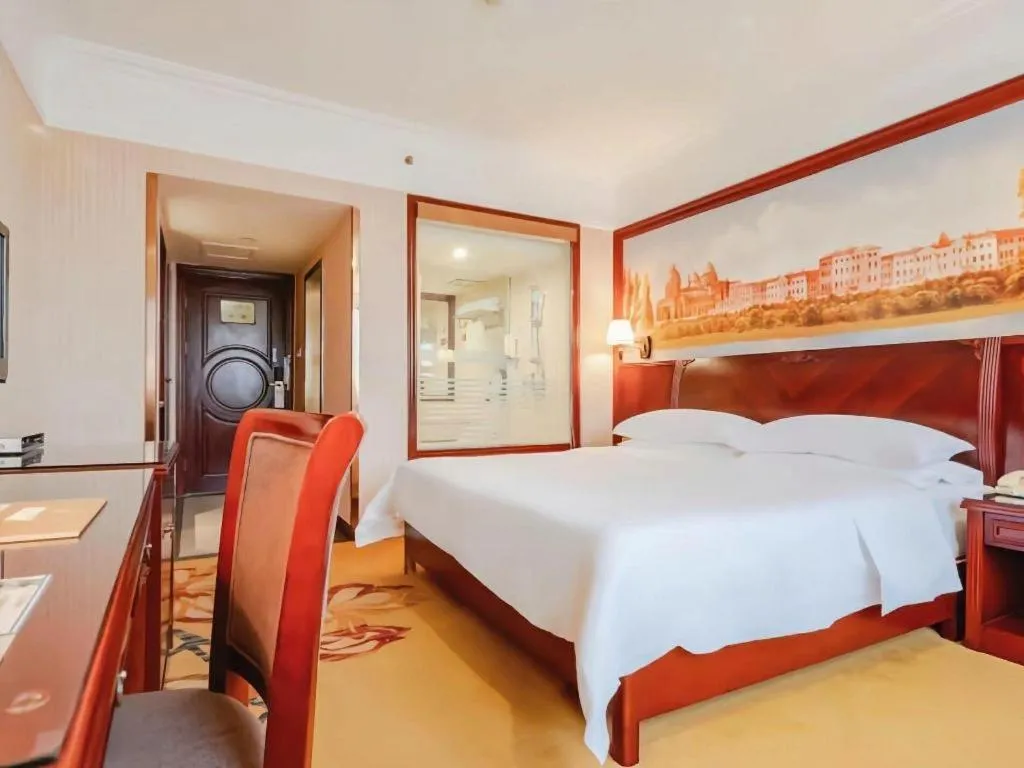 Bed in Vienna Hotel Nanning Train Station