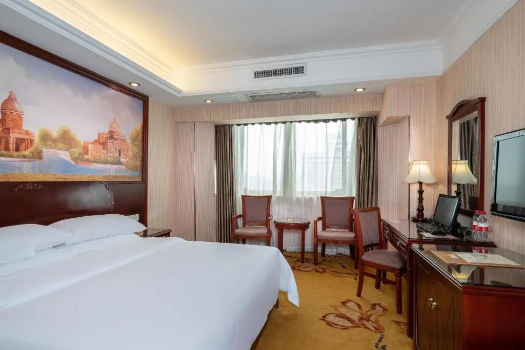 Bed in Vienna Hotel Nanning Train Station