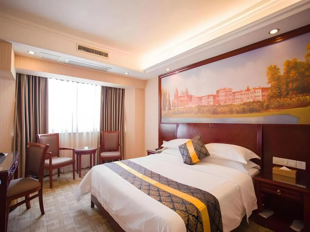 Bed in Vienna Hotel Nanning Train Station