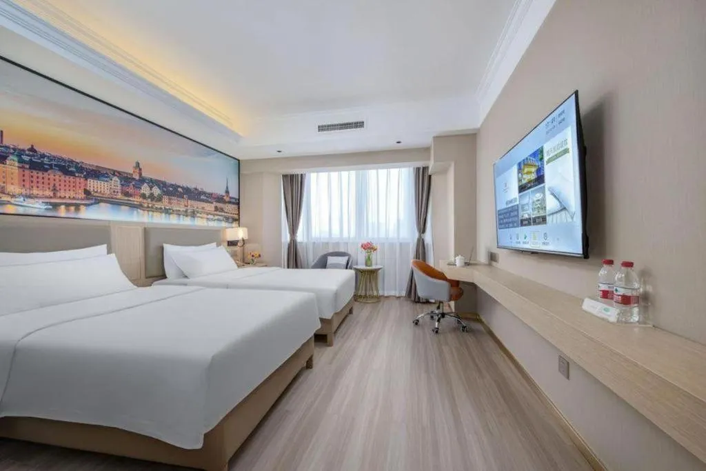 Bed in Vienna Hotel Nanning Train Station