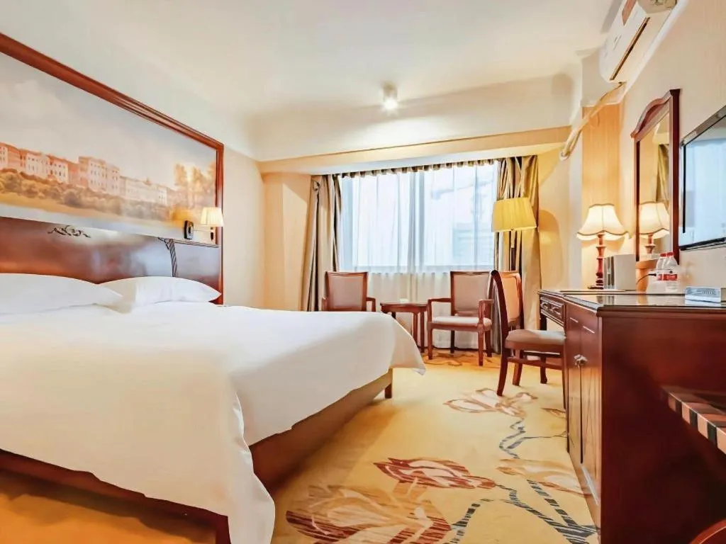 Bed in Vienna Hotel Nanning Train Station