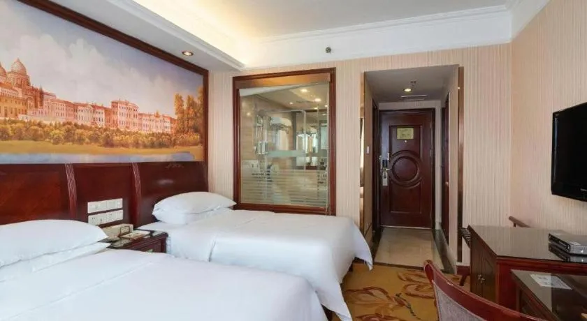 Bed in Vienna Hotel Nanning Train Station