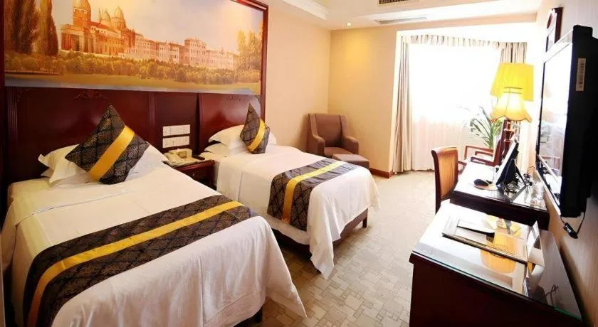 Bed in Vienna Hotel Nanning Train Station