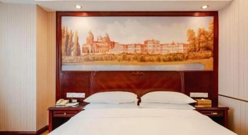 Bed in Vienna Hotel Nanning Train Station