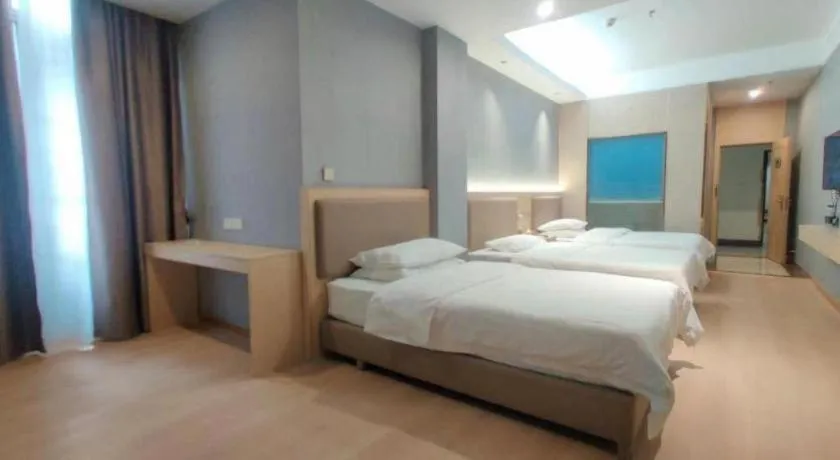 Bed in Vienna Hotel Nanning Train Station