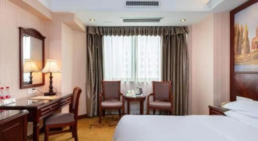 Bed in Vienna Hotel Nanning Train Station