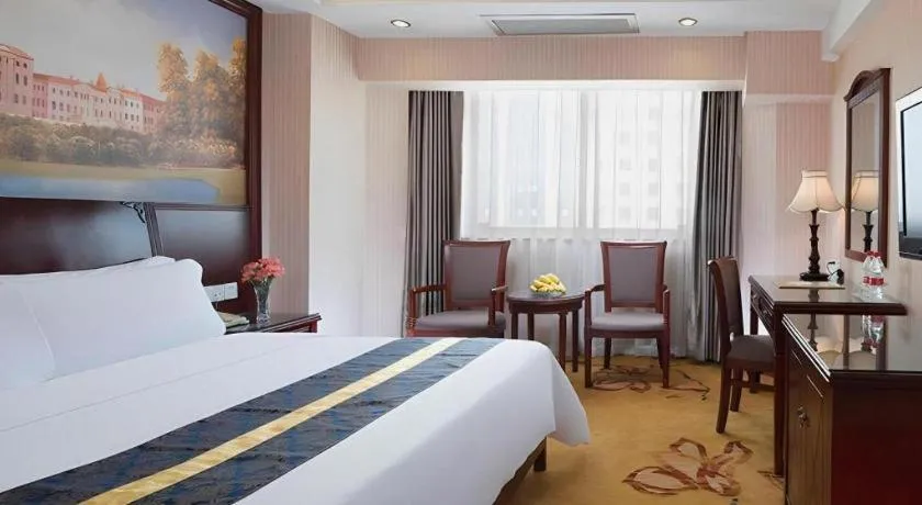 Bed in Vienna Hotel Nanning Train Station