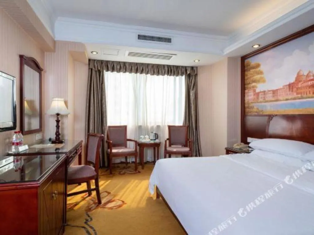 Bed in Vienna Hotel Nanning Train Station