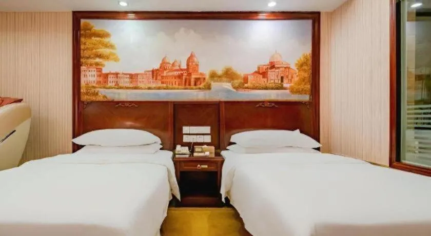 Bed in Vienna Hotel Nanning Train Station