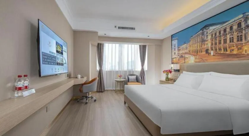 Bed in Vienna Hotel Nanning Train Station