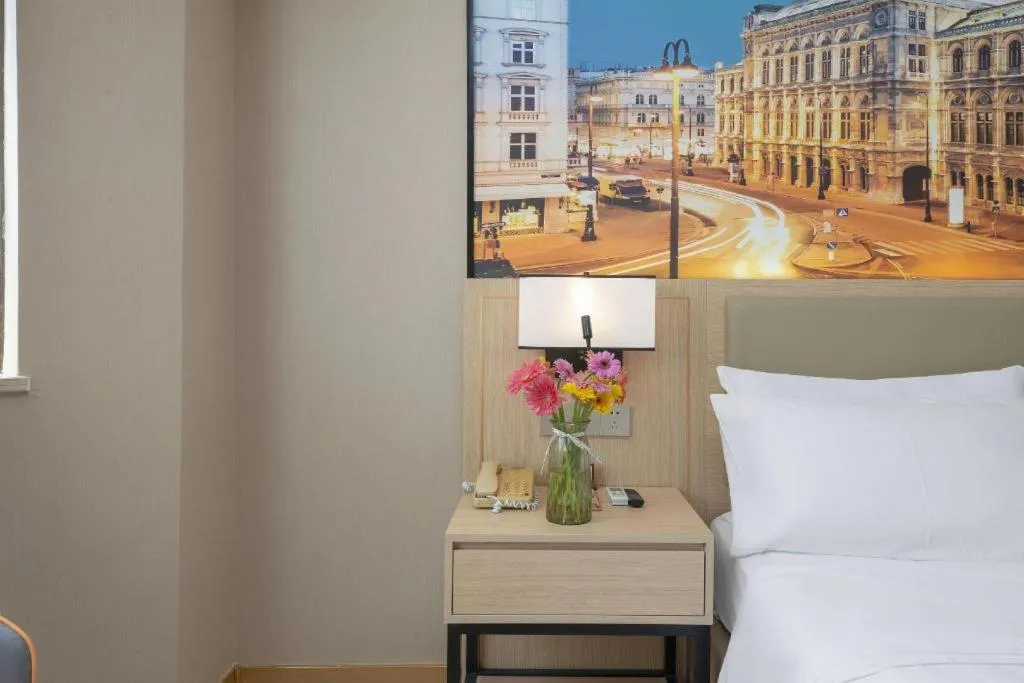 Bed in Vienna Hotel Nanning Train Station