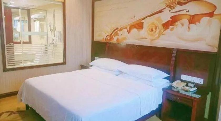 Bed in Vienna Hotel Nanning Train Station