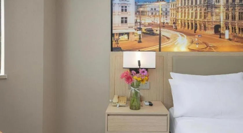 Bed in Vienna Hotel Nanning Train Station