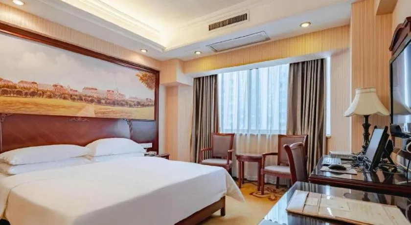 Bed in Vienna Hotel Nanning Train Station