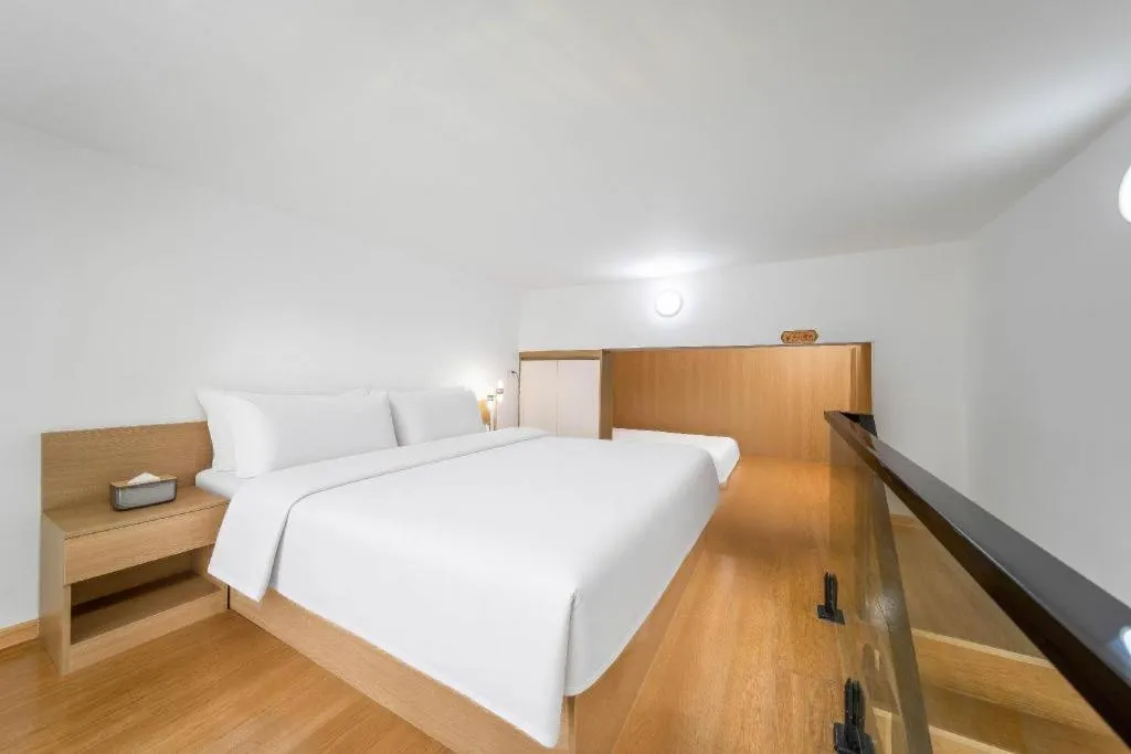 Bed in Vienna Hotel Nanning Train Station