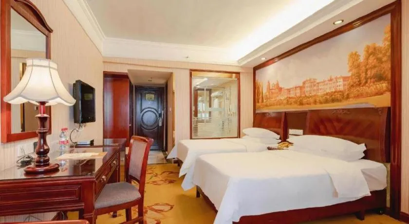 Bed in Vienna Hotel Nanning Train Station