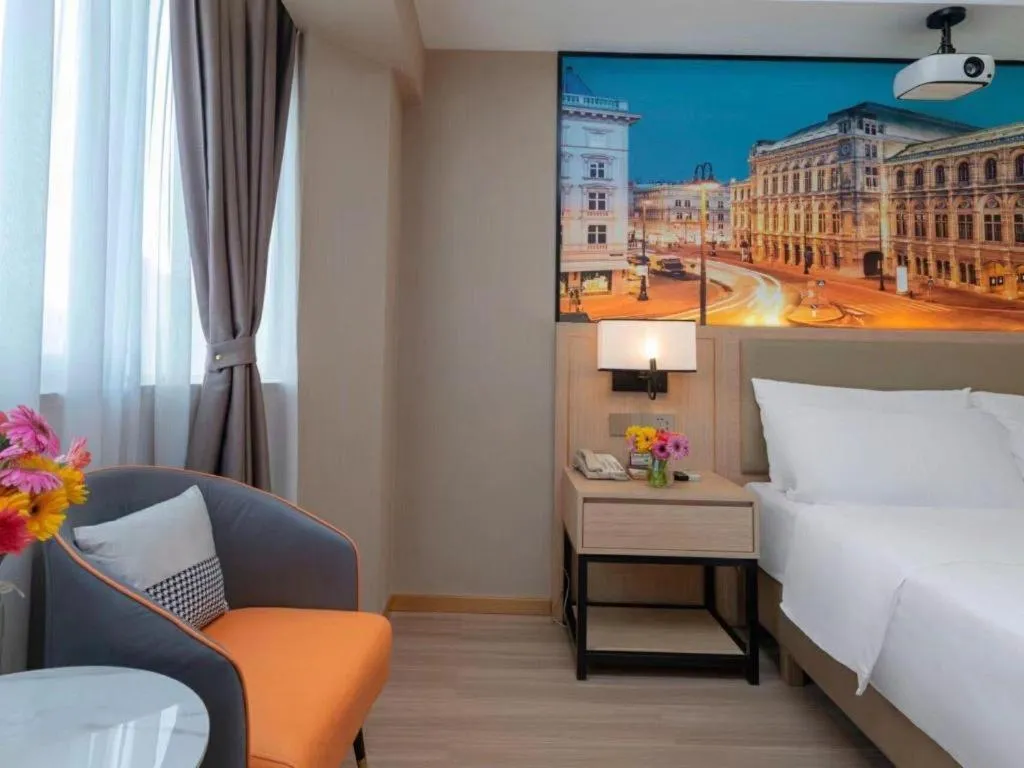 Bed in Vienna Hotel Nanning Train Station
