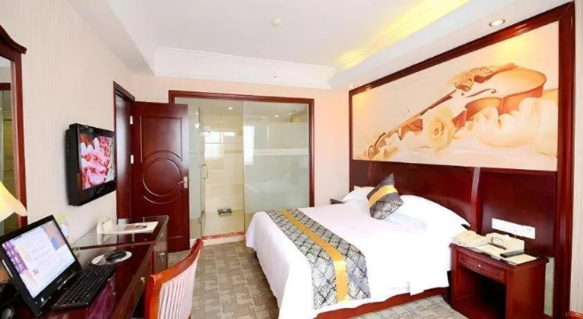 Bed in Vienna Hotel Nanning Train Station