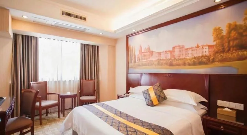 Bed in Vienna Hotel Nanning Train Station