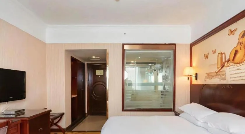 Bed in Vienna Hotel Nanning Train Station