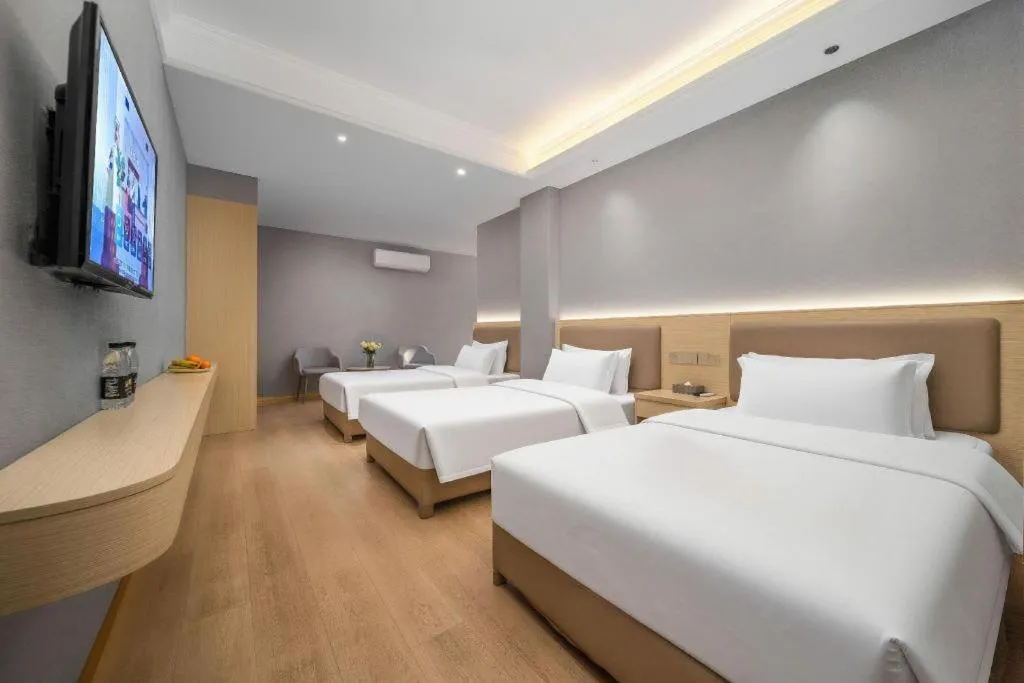 Bed in Vienna Hotel Nanning Train Station