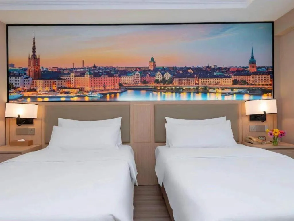 Bed in Vienna Hotel Nanning Train Station