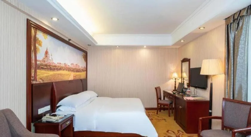 Bed in Vienna Hotel Nanning Train Station