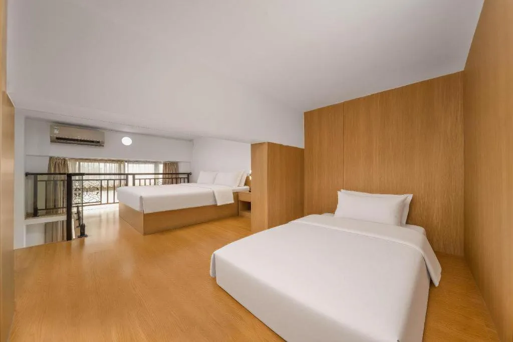 Bed in Vienna Hotel Nanning Train Station