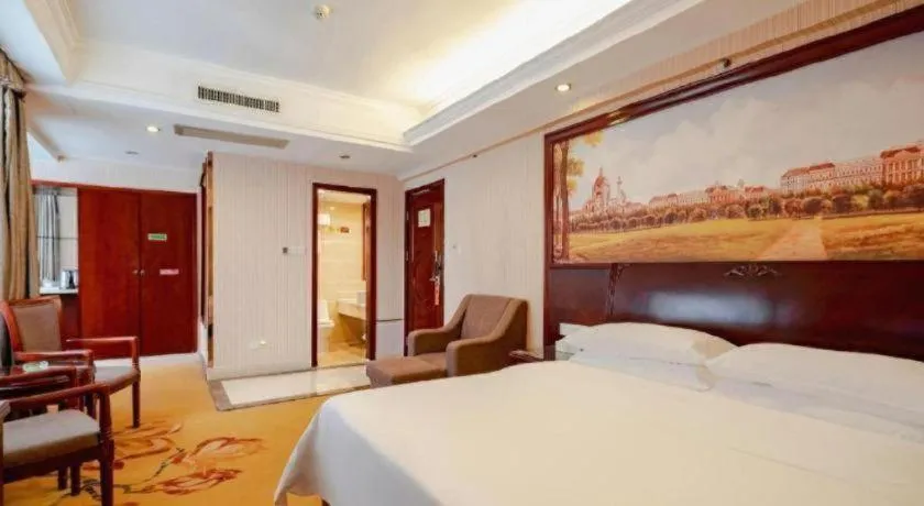 Bed in Vienna Hotel Nanning Train Station