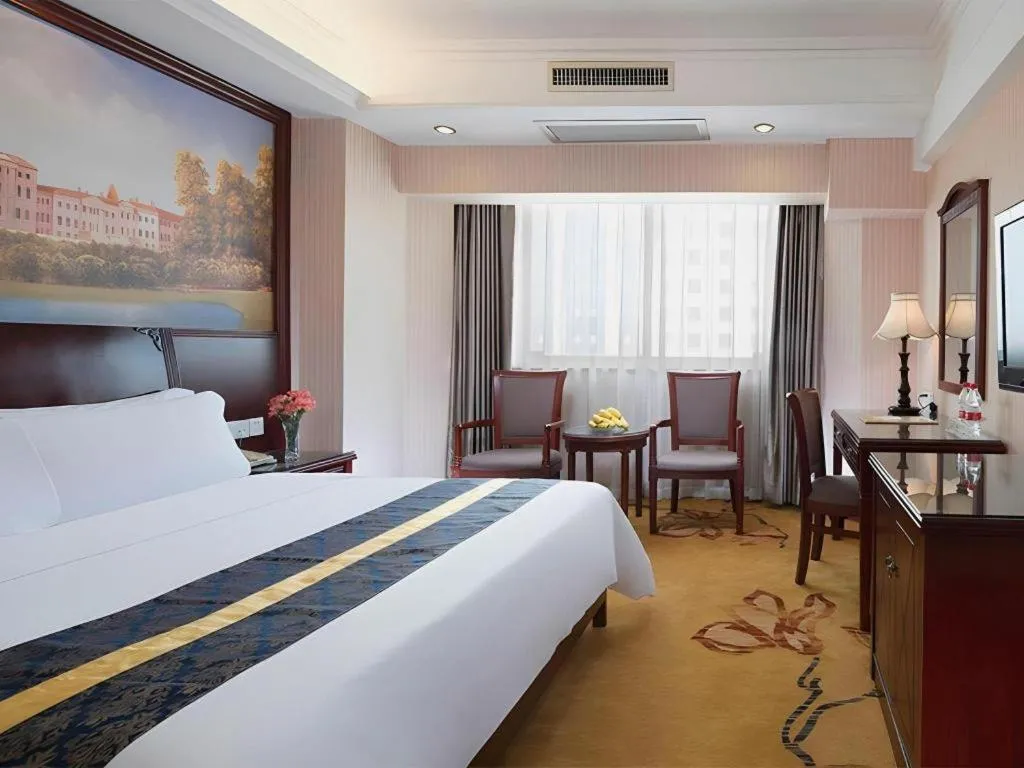 Bed in Vienna Hotel Nanning Train Station